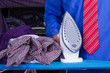 Businessman Ironing Clothes