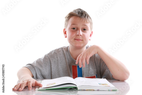 Photo: boy reading a book boy reading a book