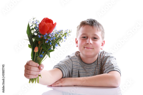 Photo: Happy teenager with bouquet of flowers Happy teenager with bouquet of flowers