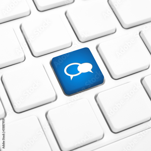 Photo: Social business concept balloon icon key on a keyboard Social business concept balloon icon key on a keyboard