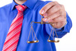 Businessman Shows Scales