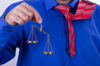 Businessman Shows Scales