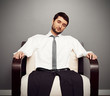 fatigued businessman on the armchair