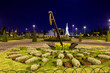 Lisboa at night, old large anchor in a garden, Portugal