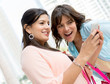 Girls using a smart phone