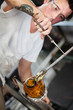 Serious Artist Working with Glass