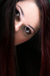 Photo: Woman covers part of face by straight long hair Woman covers part of face by straight long hair
