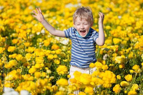 Photo: kid at the flower field kid at the flower field
