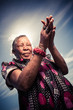 Coloured woman praying  for better days