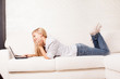 Woman on the sofa with laptop
