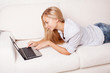 Woman on the sofa with laptop