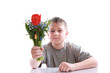 Happy teenager with bouquet of flowers
