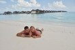 Photo: happy young couple at summer vacation have fun and relax happy young couple at summer vacation have fun and relax