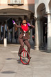 business woman go to work in monocycle