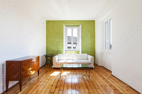 Photo: home interior, view white sofa and window home interior, view white sofa and window