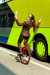 business woman go to work in monocycle