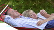 Video: Romantic Senior Couple Relaxing In Garden Hammock Together Romantic Senior Couple Relaxing In Garden Hammock Together