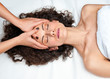 woman having cyropractick neck adjustment