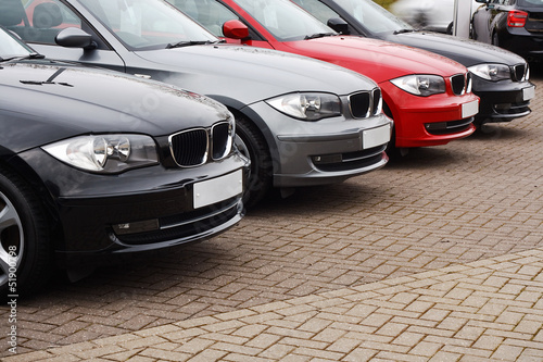 Photo: line of luxury used cars line of luxury used cars