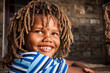 Coloured Little boy looking up in admiration
