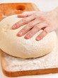 Dough on wooden board