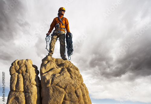 Photo: Climber on the summit. Climber on the summit.