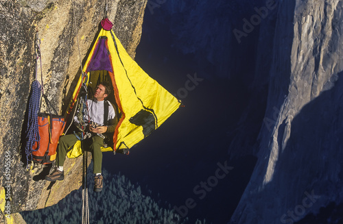 Photo: Climber on the edge. Climber on the edge.