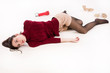 Lifeless brunette lying on the floor