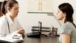 Conversation with patient in office - tracking shot