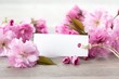 Foto: Label with japanese cherry on background Label with japanese cherry on background