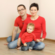 Portrait of a happy family with young children