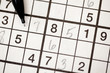 Sudoku puzzle and pencil