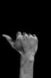 Hand on black back - one