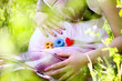 Word boy written with colorful alphabet cubes on pregnant belly