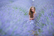 Woman standing on a lavender field