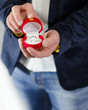 Photo: Engagement ring or present given by male hands Engagement ring or present given by male hands