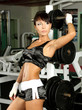 Attractive athletic fitness model doing fitness
