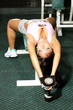 Attractive athletic fitness model doing fitness