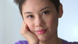 Happy Mixed race Asian woman smiling