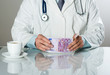 doctor with money