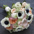 Photo: Wedding bouquet of pink roses, white anemone, pink ranunculus Wedding bouquet of pink roses, white anemone, pink ranunculus