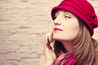 Photo: Pretty girl paint her lips Pretty girl paint her lips