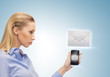 woman holding phone with sign of sms