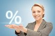 woman showing sign of percent in her hands