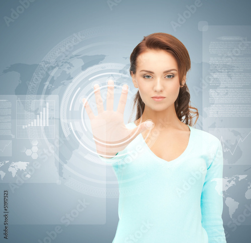 Photo: businesswoman touching virtual screen businesswoman touching virtual screen