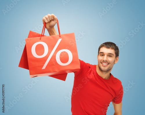 Photo: man with shopping bags man with shopping bags