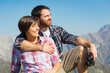 Young Couple at Top of Mountain