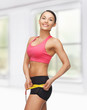 sporty woman with measuring tape