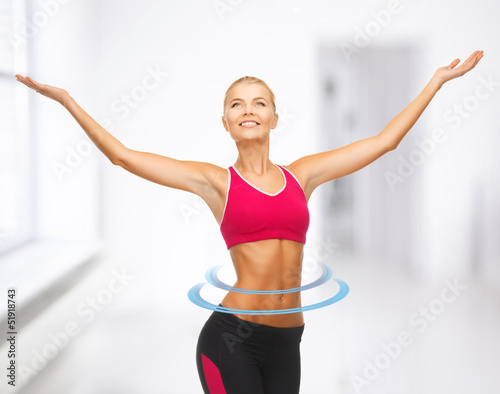 Photo: sportswoman with raised up hands sportswoman with raised up hands