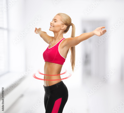 Photo: sportswoman with raised up hands sportswoman with raised up hands